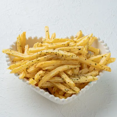 Porción papas fritas con orégano